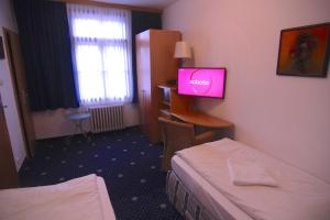 Posteľ alebo postele v izbe v ubytovaní Hotel Klika