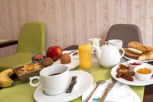 
Breakfast options available to guests at Brit Hotel des Halles
