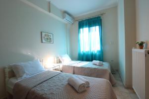 A bed or beds in a room at Golden Key Villas