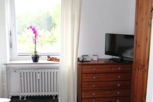 TV a/nebo společenská místnost v ubytování Hotel Windthorst