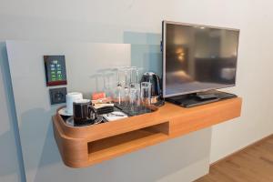 Telewizja i/lub zestaw kina domowego w obiekcie Hotel Ploberger