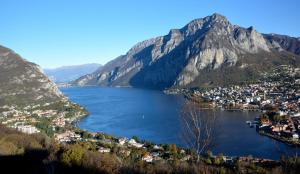 a large body of water with a town and mountains at meschihouse - Leonardo 35 in Lecco