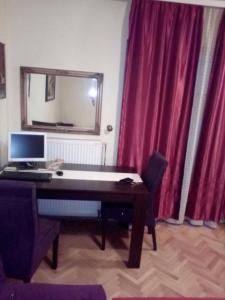 TV a/nebo společenská místnost v ubytování Apartment Viktor 2 stan na dan