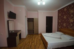 Кровать или кровати в номере Marani Hotel
