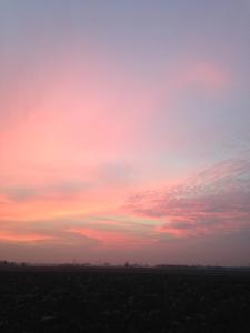 The sunrise or sunset as seen from a vidéki vendégházakat or nearby
