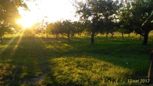 The sunrise or sunset as seen from a vidéki vendégházakat or nearby
