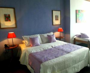Cama o camas de una habitación en Luna Bahia Pousada