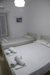 Postel nebo postele na pokoji v ubytování Mare Blue Ios