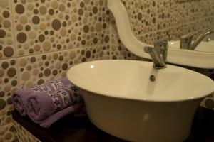 Ein Badezimmer in der Unterkunft Passion Fruit Apartment