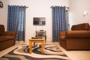 Foto da galeria de Travellers Palm Court em North Legon