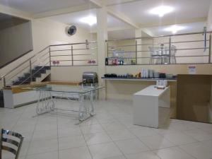 Kuchyň nebo kuchyňský kout v ubytování Conquista Palace Hotel