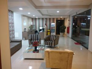 Posezení v ubytování Conquista Palace Hotel