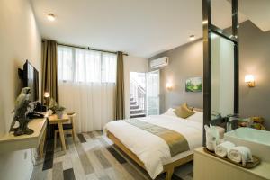 Μια τηλεόραση ή/και κέντρο ψυχαγωγίας στο Guilin Lakeside Yige Hotel