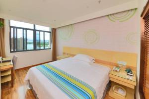 Легло или легла в стая в GreenTree Inn AnHui Ningguo Ningguo Avenue Business Hotel