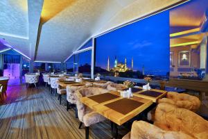 Um restaurante ou outro lugar para comer em Hotel Perula & SPA