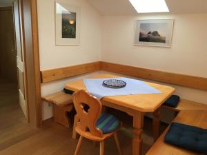 a small dining room with a table and a chair at Marie-Anne in Garmisch-Partenkirchen
