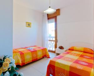 A bed or beds in a room at Castore