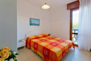A bed or beds in a room at Castore Még 27 kép