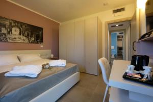 TV a/nebo společenská místnost v ubytování Relais Villa Clodia