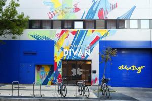 three bikes parked in front of a building at Apartamentos Divan in Vitoria-Gasteiz