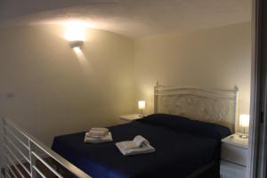A bed or beds in a room at B&B Il Conservatorio