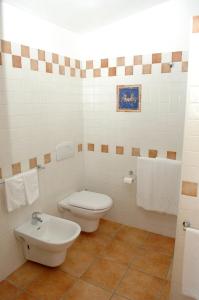 Koupelna v ubytování Hotel Costa Caddu