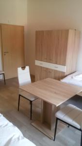 Posteľ alebo postele v izbe v ubytovaní Rodinný wellness hotel U Langrů
