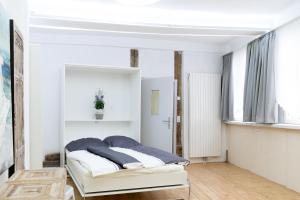 
Ein Bett oder Betten in einem Zimmer der Unterkunft Ferienwohnung Wolfenbüttel
