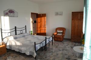 Postel nebo postele na pokoji v ubytování Il Giardino del Gallo