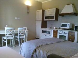 A kitchen or kitchenette at All'Antica Ruggine