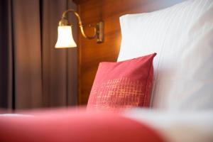 Ein Bett oder Betten in einem Zimmer der Unterkunft Pension VILLA KLEINE WARTBURG