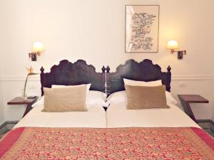 A bed or beds in a room at La Casa de Vegueta