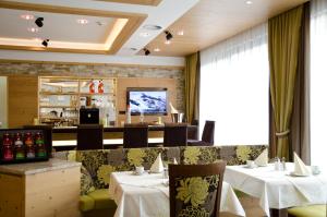 Restoran atau tempat lain untuk makan di Hotel Garni Arosa