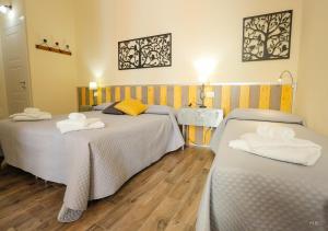 Ein Bett oder Betten in einem Zimmer der Unterkunft Colors of Cinque Terre - Guest House