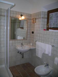 Koupelna v ubytování Les Chalets B&B