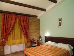 Postel nebo postele na pokoji v ubytování Les Chalets B&B