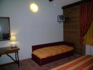 Postel nebo postele na pokoji v ubytování Les Chalets B&B