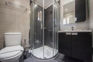 A bathroom at Iliada Beach Hotel Még 37 kép