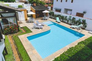 A piscina localizada em Pousada Rosa dos Ventos Juquehy ou nos arredores