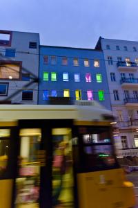 a blurry picture of a building with colorful windows at Old Town Hostel in Berlin