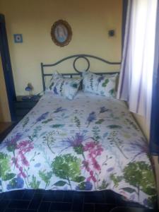Postel nebo postele na pokoji v ubytování Villa Casa rosa Maria