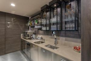 Kuchyň nebo kuchyňský kout v ubytování Hotel Veronesi + 37 fotografií