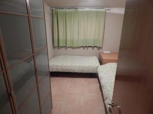 Postel nebo postele na pokoji v ubytování Casa Canut