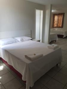 Postel nebo postele na pokoji v ubytování Leal Classic Hotel