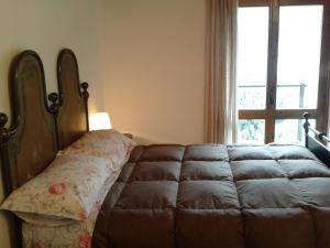 Postel nebo postele na pokoji v ubytování Casetta dei Ciclamini