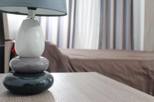 A bed or beds in a room at Vatican In The Moonlight Apartment