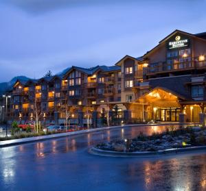 a view of a hotel at night at Executive Suites Hotel and Resort, Squamish in Squamish