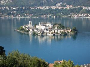 an island in the middle of a large body of water at Casa Avezza in Omegna