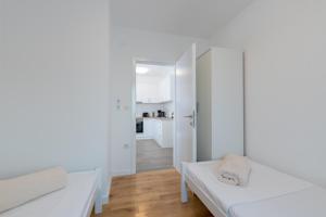 Postel nebo postele na pokoji v ubytování Villa Anja
