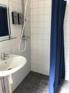 Ett badrum på Hotell Hässlö
